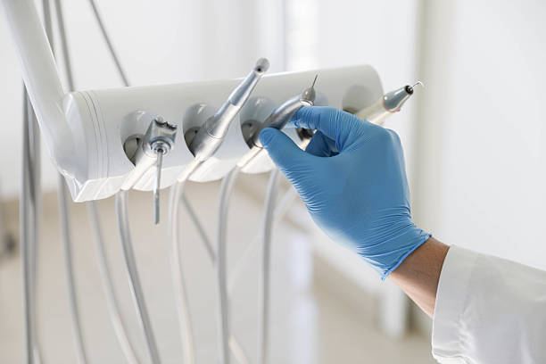 Professional Tooth Extraction technician working in Mineola, NY